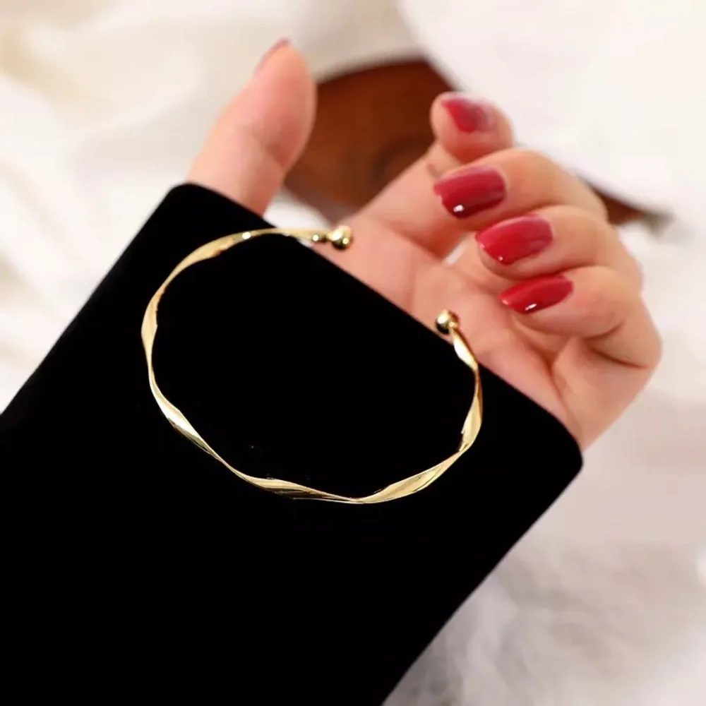 “Anya” Minimalist Twist Open Adjustable Gold Neutral Fashion Simple Bracelet - Picture 6 of 9